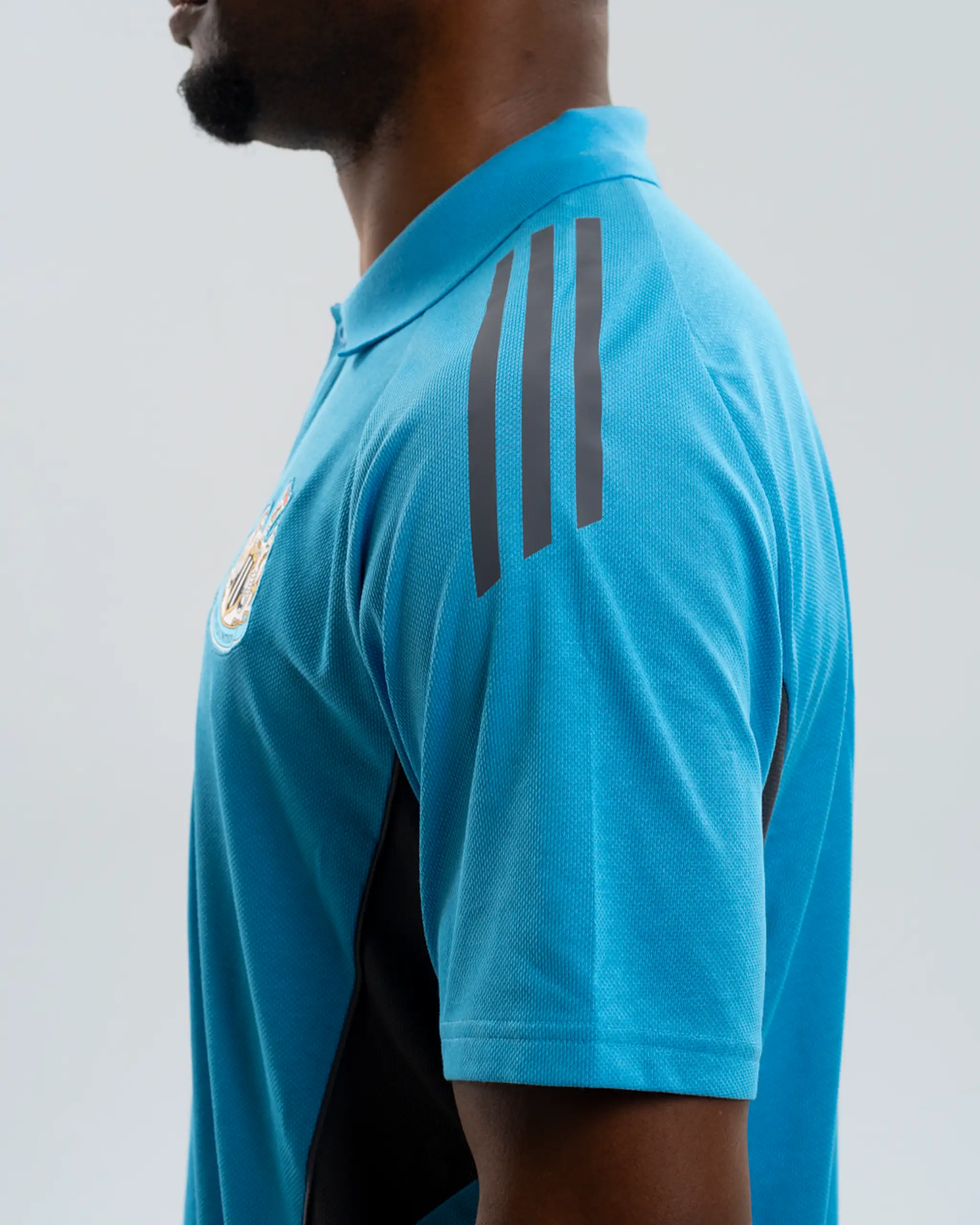 Newcastle United adidas 25/26 Players Range Blue Polo Shirt - Image 5