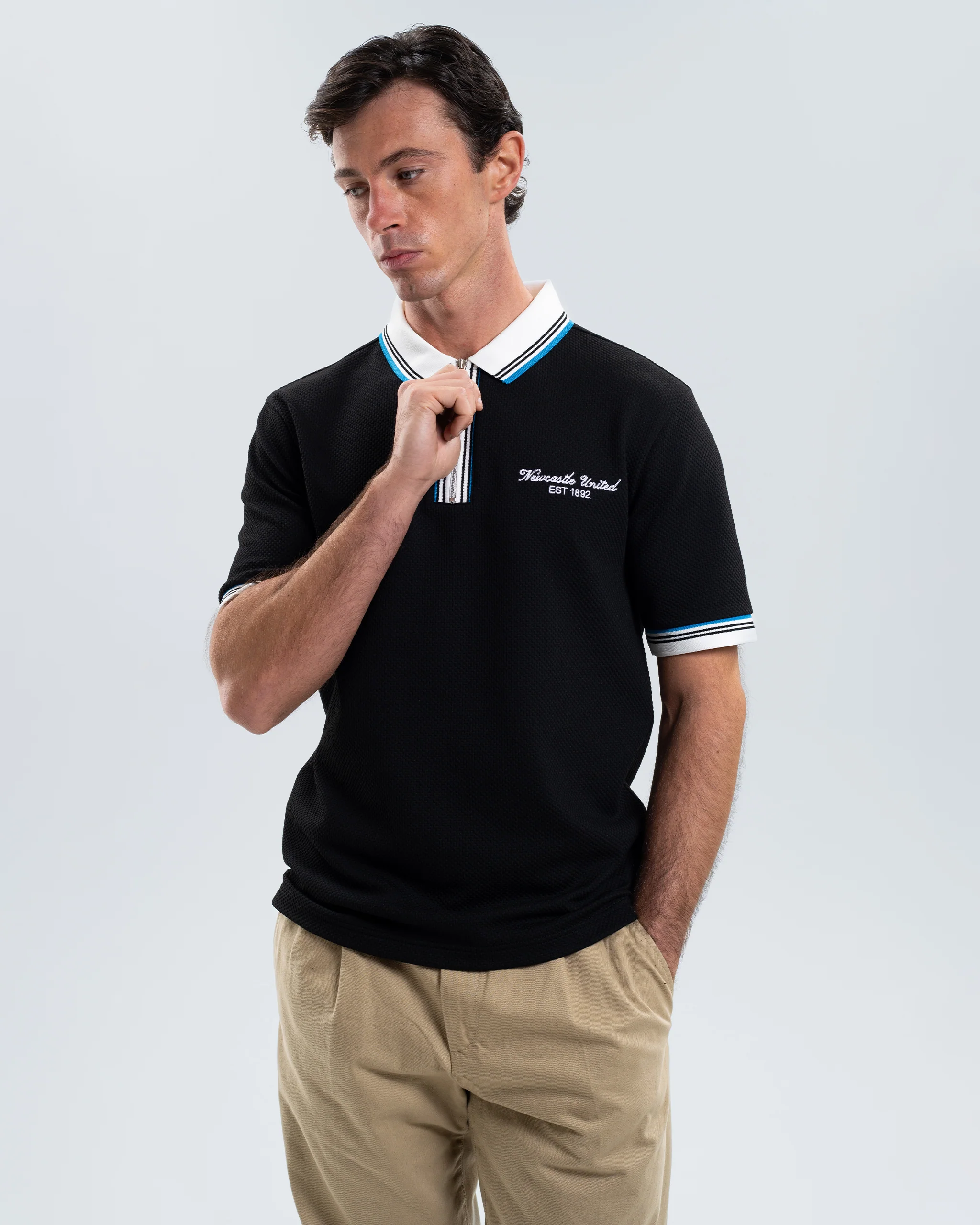 Newcastle United Men's Zipped Black Polo Shirt - Image 4